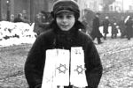 Jewish Boy in the Krakow Ghetto, selling Armbands